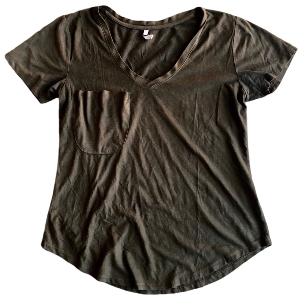 Really soft dark evergreen. Very comfortable. Little pocket on right chest.